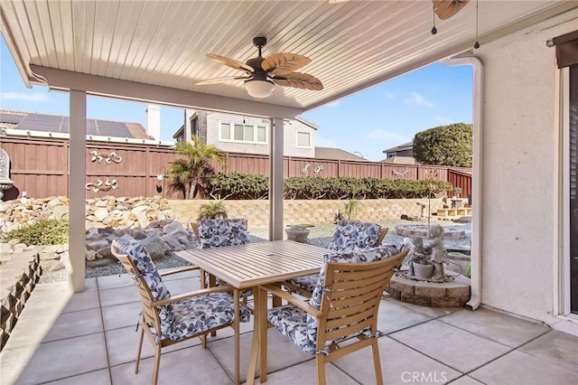 view of patio / terrace featuring ceiling fan