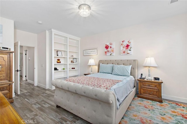 bedroom featuring light hardwood / wood-style floors