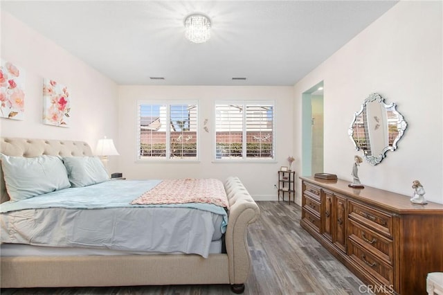 bedroom featuring hardwood / wood-style floors