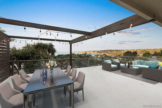 patio terrace at dusk with outdoor lounge area