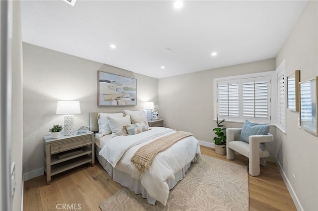 bedroom featuring light wood-type flooring