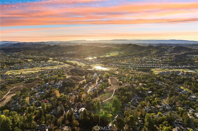 aerial view at dusk with a mountain view