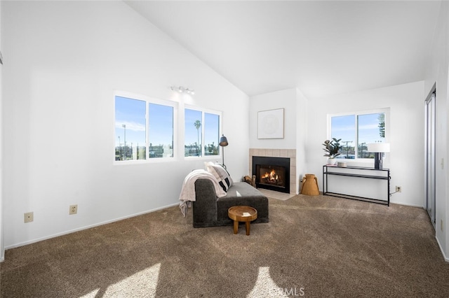 sitting room with a fireplace, high vaulted ceiling, and carpet