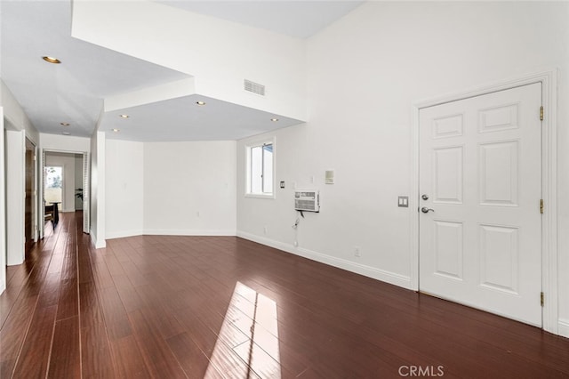 interior space with dark hardwood / wood-style flooring