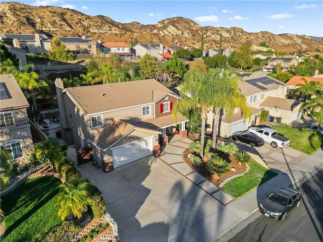 drone / aerial view featuring a mountain view