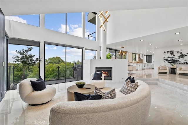 living room featuring a high ceiling