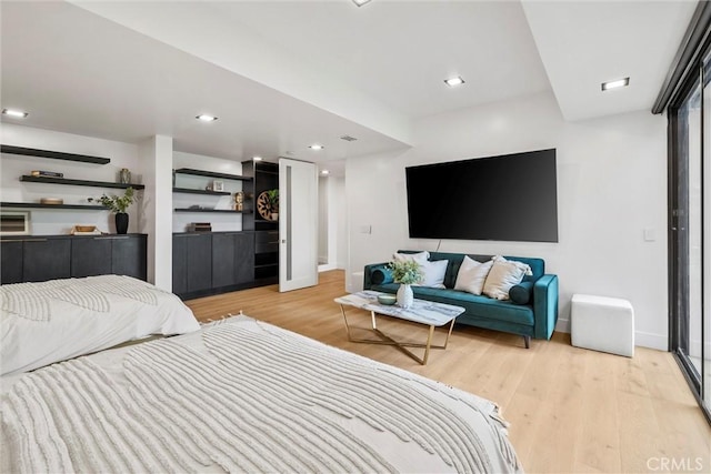 bedroom featuring light wood-type flooring