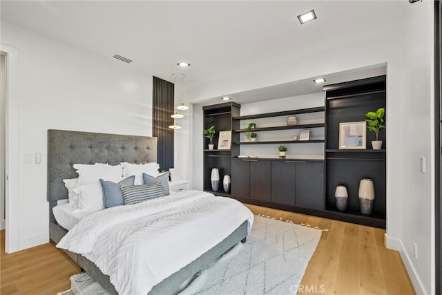 bedroom featuring light hardwood / wood-style flooring