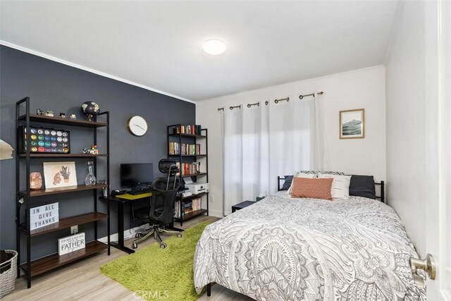 bedroom featuring hardwood / wood-style flooring