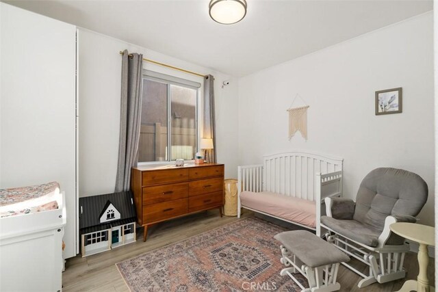 bedroom featuring light hardwood / wood-style flooring