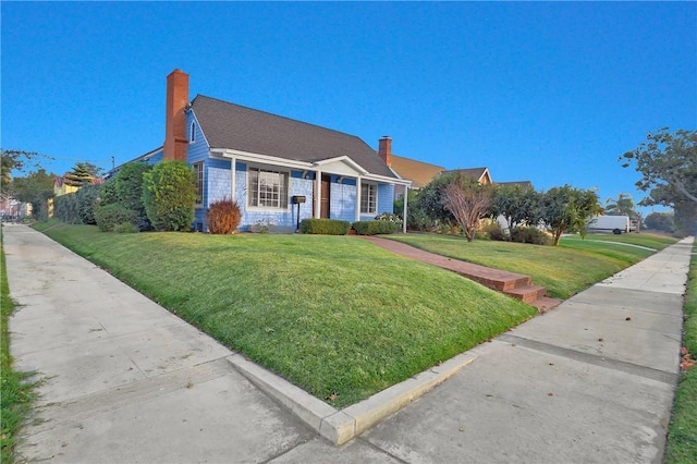 view of front facade with a front lawn