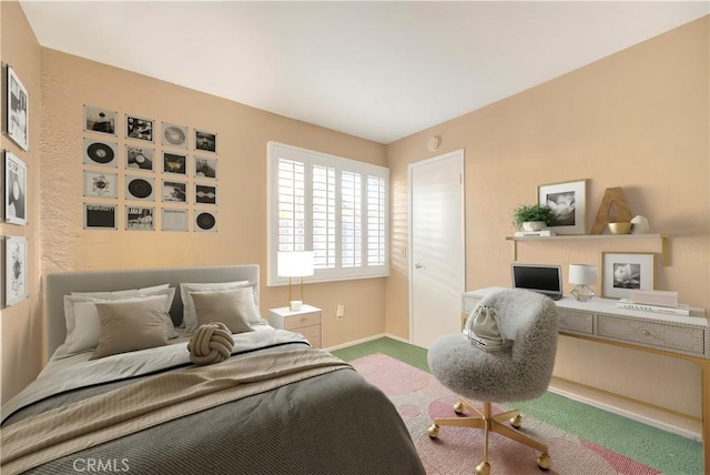 bedroom featuring carpet floors