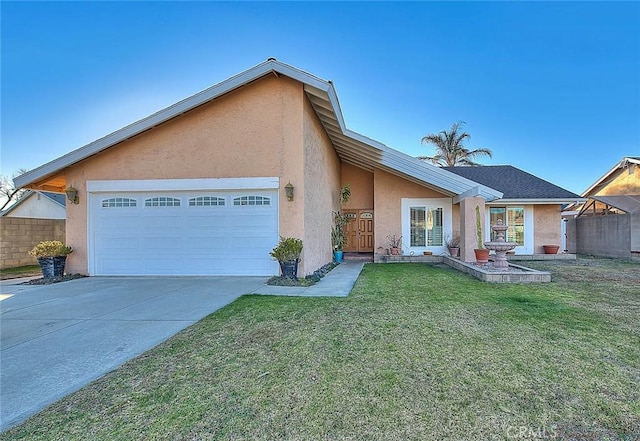 ranch-style house featuring a front yard and a garage