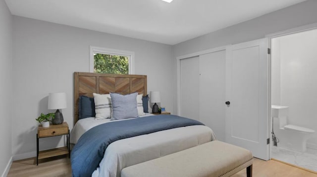 bedroom with light hardwood / wood-style floors