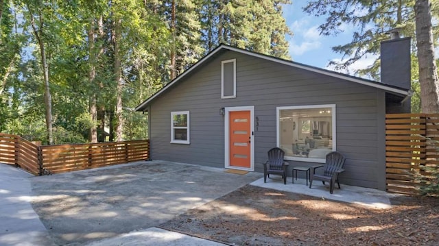 rear view of property with a patio