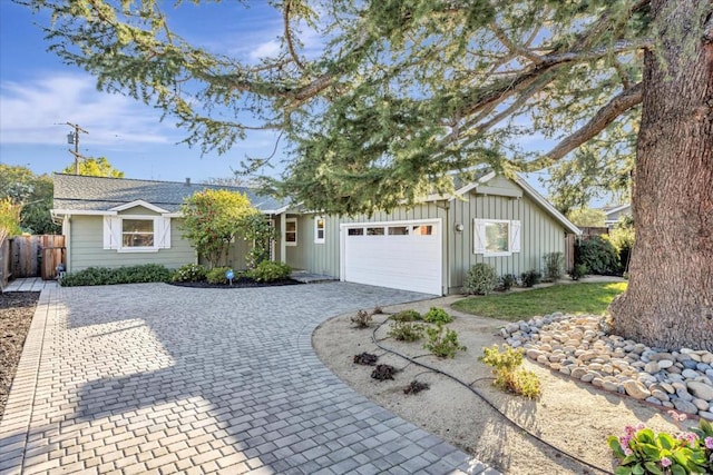 single story home with a garage