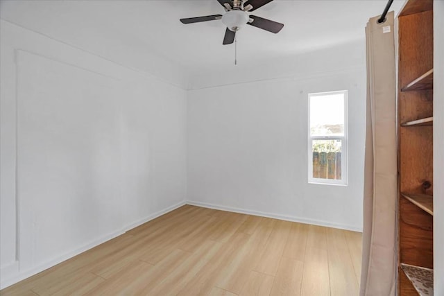 unfurnished room with light hardwood / wood-style floors and ceiling fan