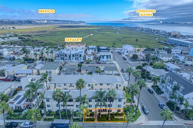 birds eye view of property with a mountain view