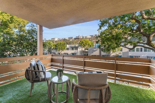 view of patio with a balcony