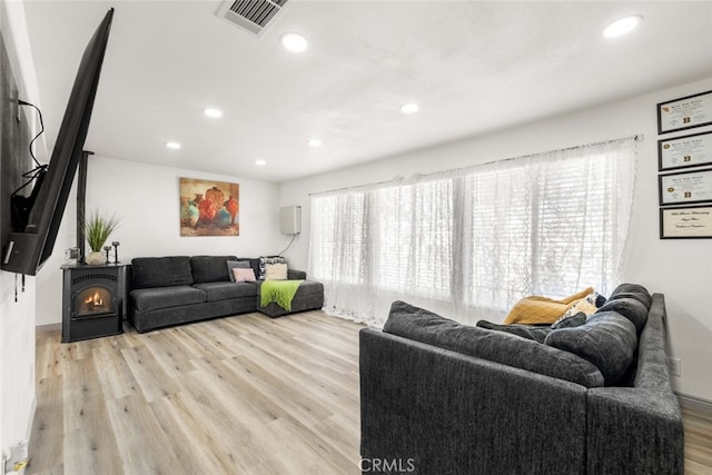 living room with light hardwood / wood-style floors