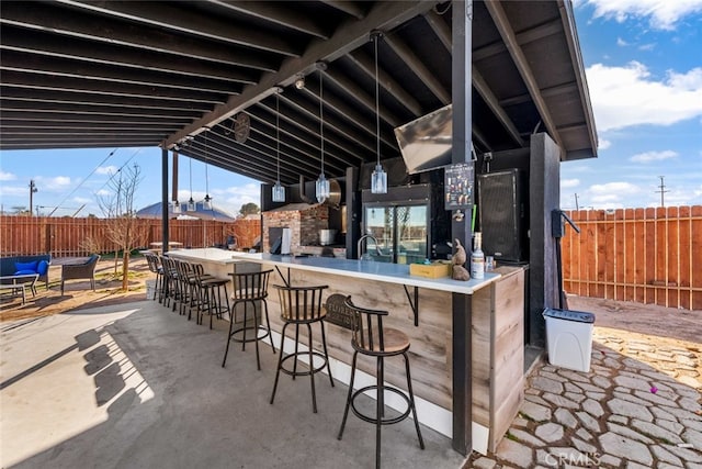 view of patio featuring a bar