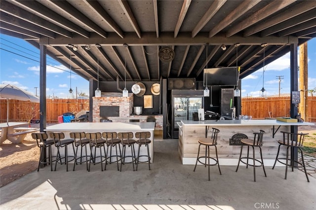 view of patio / terrace with exterior bar