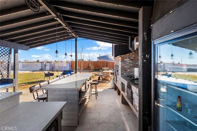 view of patio / terrace with exterior bar