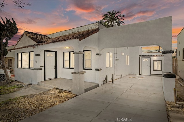 view of front of property with a patio