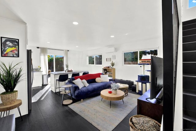 living room featuring a wall mounted air conditioner