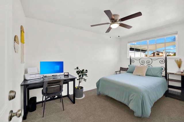 bedroom with ceiling fan and carpet