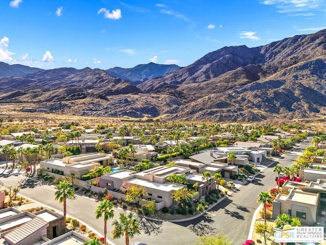 drone / aerial view featuring a mountain view