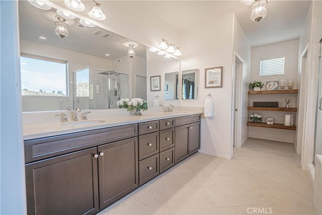 bathroom with vanity and walk in shower