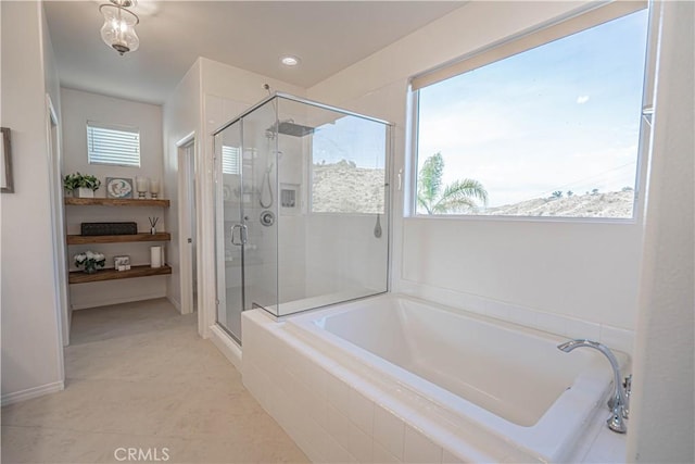 bathroom with independent shower and bath