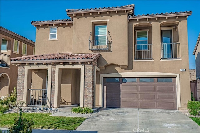 mediterranean / spanish-style house featuring a garage