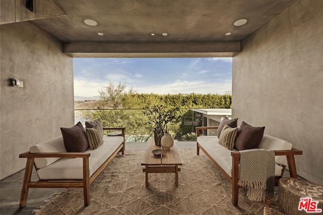 balcony with a patio area and outdoor lounge area