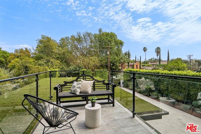 balcony featuring an outdoor living space