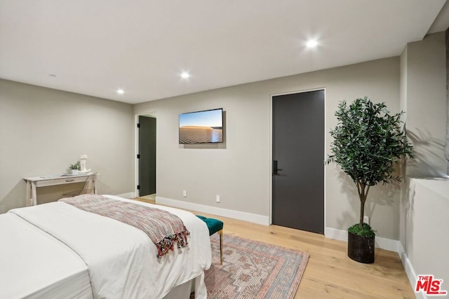 bedroom featuring light wood-type flooring