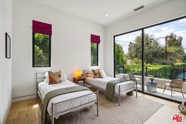 bedroom featuring hardwood / wood-style flooring