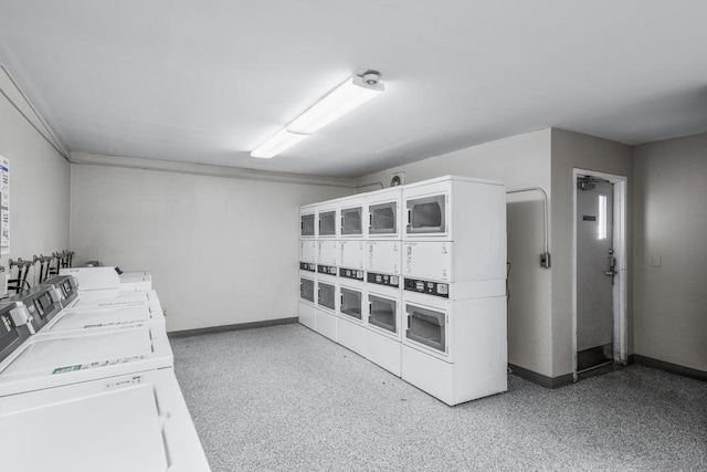 clothes washing area featuring stacked washer / dryer and separate washer and dryer