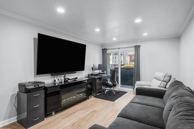 living room featuring ornamental molding and light wood-type flooring