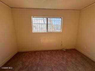 view of carpeted spare room