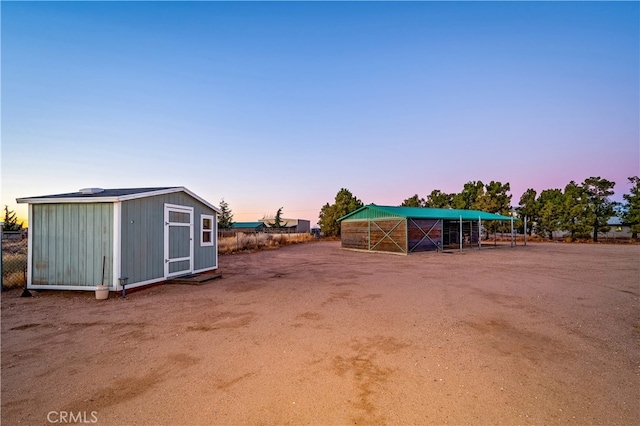 exterior space featuring a storage shed