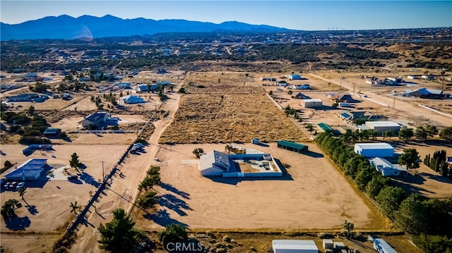 drone / aerial view featuring a mountain view