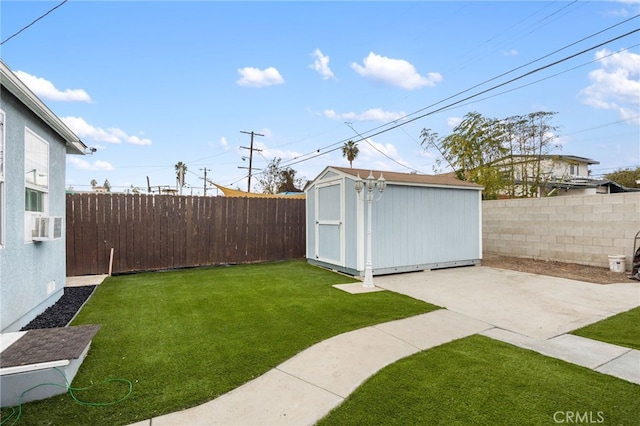 view of yard featuring a patio area and a storage shed