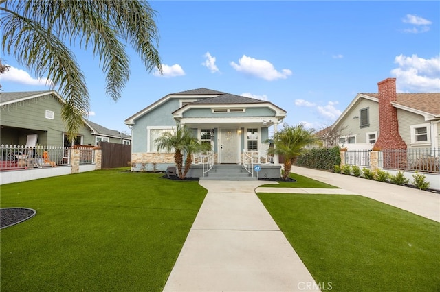 view of front facade with a front lawn