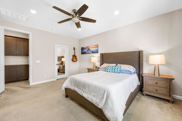 bedroom featuring recessed lighting, baseboards, visible vents, and light colored carpet