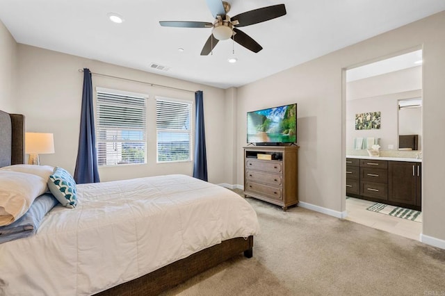 bedroom featuring recessed lighting, visible vents, light carpet, and baseboards