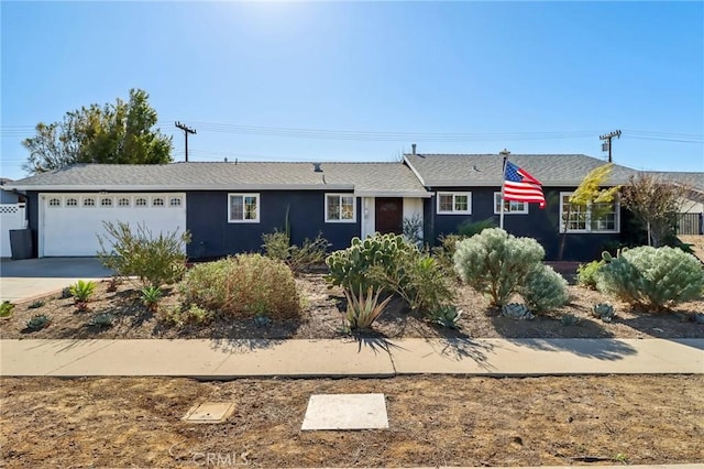 single story home with a garage