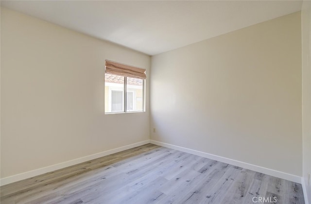 empty room featuring light hardwood / wood-style floors