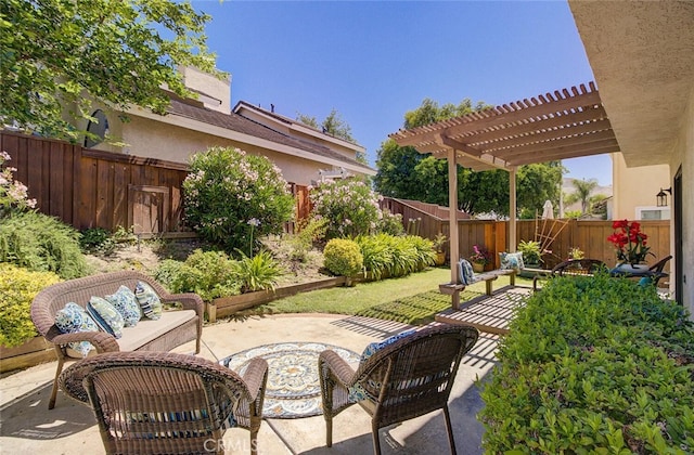 view of patio / terrace featuring an outdoor hangout area and a pergola